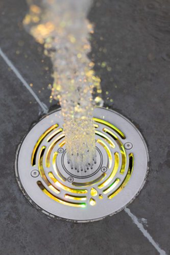 Yellow LED Jumping Jets with water shooting out.