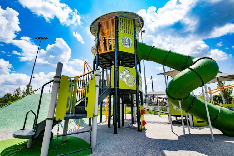 Large green and orange playground structure.