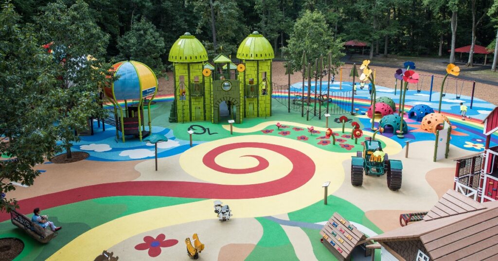 Colorful poured-rubber surfacing in fun swirls, clouds, and flowers.