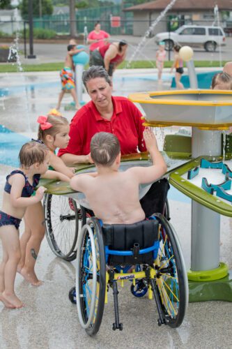 Kids playing at splashpad.