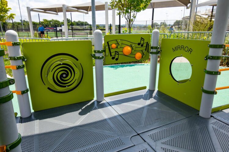 Interactive mirror and gear panels at the Fields at RFK playground in Washington, DC, installed by Sparks at Play using LSI equipment.