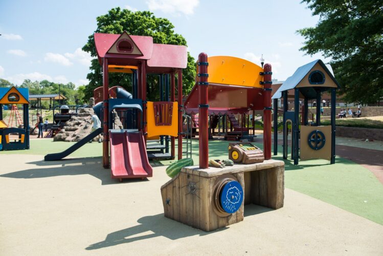 View behind custom farmer's market with 2-5 playground structure in background at Turkey Thicket Recreation Center Washington DC