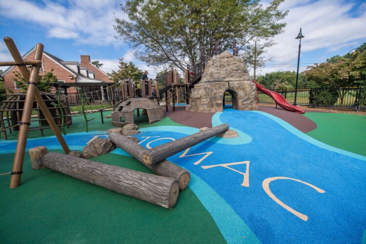Potomac River-themed Poured-in-Place surfacing at the Palisades Recreation Center playground in Washington, DC, installed by Sparks at Play using Surface America surfacing.