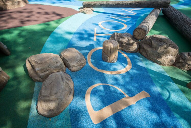 Log steppers at the Palisades Recreation Center playground in Washington, DC, installed by Sparks at Play using LSI equipment.