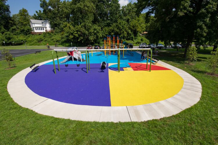 38th Ave Neighborhood Park colorful blue purple yellow and red pour-in-place playground surfacing by Surface America in Hyattsville MD