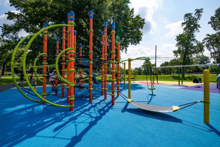 38th Ave Neighborhood Park orange Netplex climbing structure with interconnected nets and bridges in Hyattsville MD