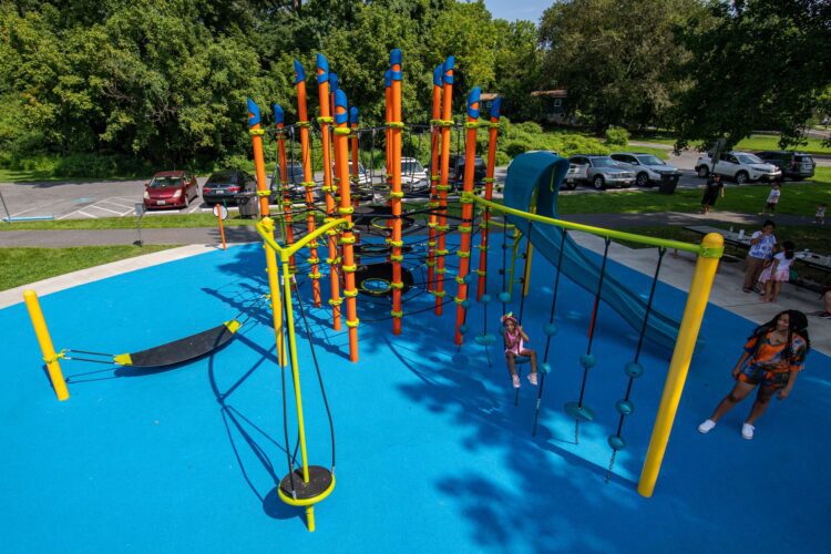 38th Ave Neighborhood Park orange Netplex climbing structure with interconnected nets and bridges in Hyattsville MD