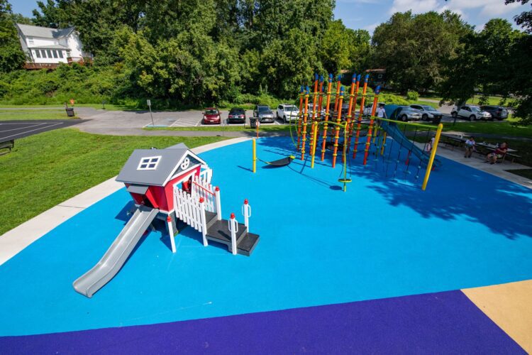 38th Ave Neighborhood Park orange Netplex climbing structure and red Smart Play Fire Station playground in Hyattsville MD