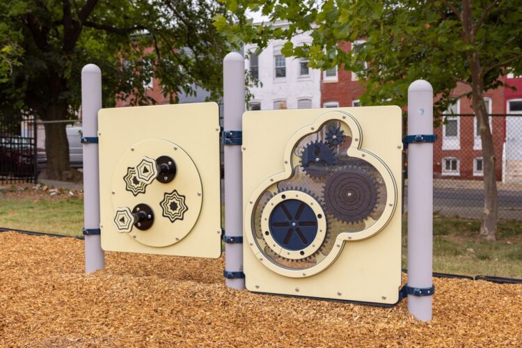 Close-up of Landscape Structures Gear Panels at Franklin Square Elementary playground Baltimore MD