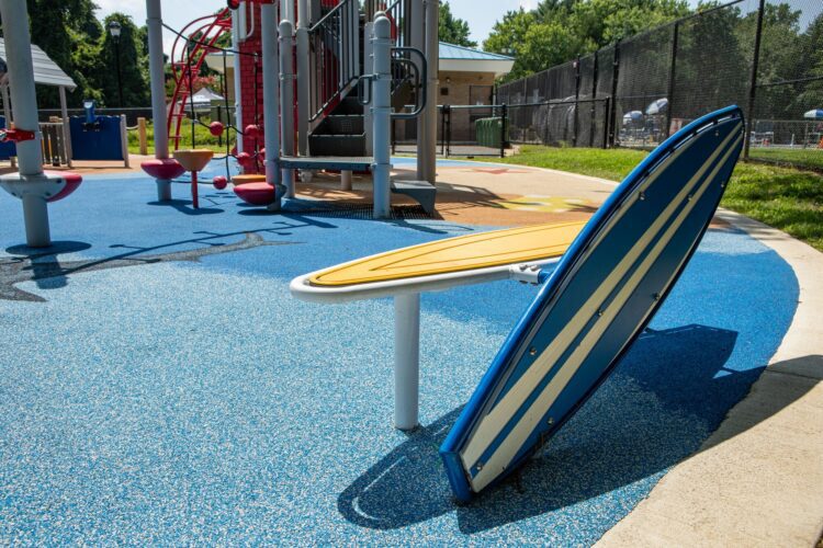 Custom surfboard bench at beach-themed playground J. Franklyn Bourne Park Capitol Heights MD