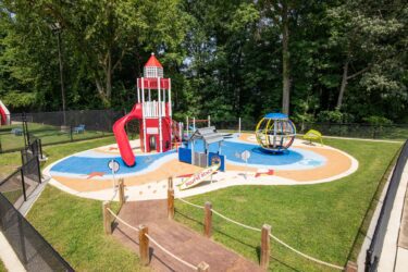 Overview of beach-themed playground at J. Franklyn Bourne Park Capitol Heights MD by Landscape Structures